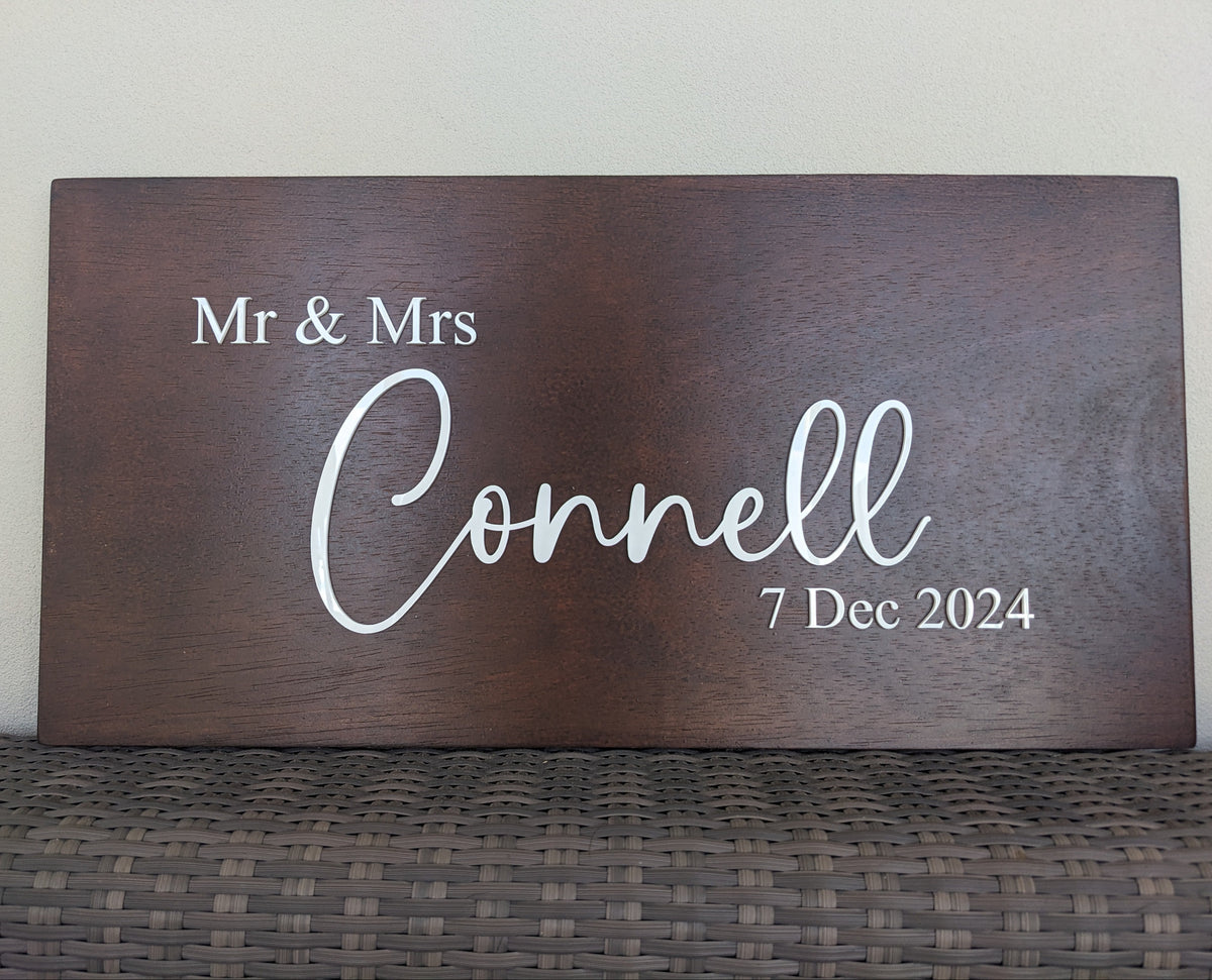 Personalised wooden wedding sign in walnut stain with white acrylic lettering