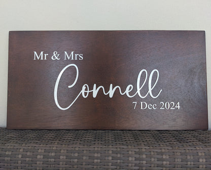 Personalised wooden wedding sign in walnut stain with white acrylic lettering