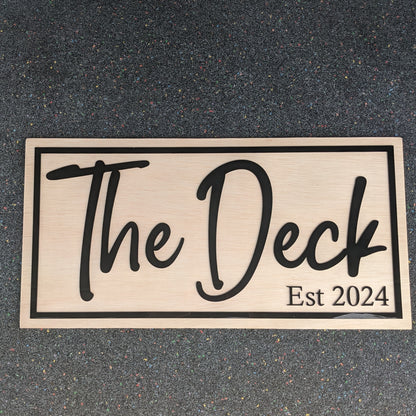 The Deck est custom made sign for their back deck porch