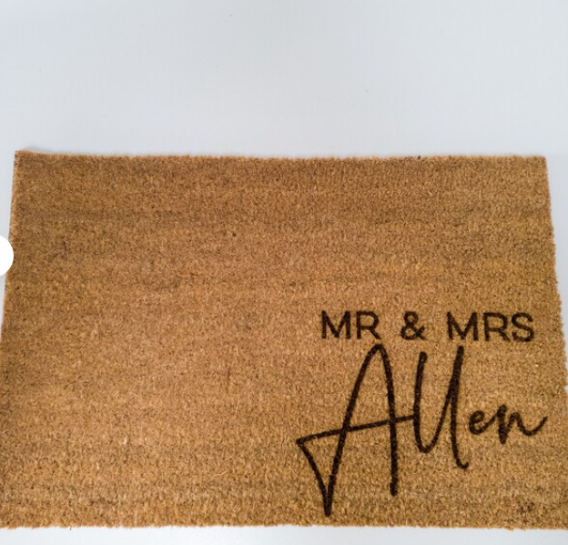 Doormat with 'MR & MRS Allen' text on a plain background. Personalised Doormat