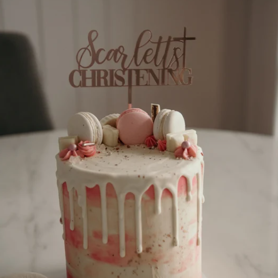 Decorative cake with 'Scarlett's Christening' topper in Rose Gold