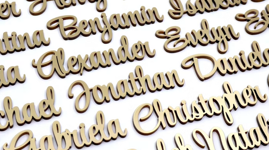 Laser Cut Place Cards - Individual guest name cutouts.