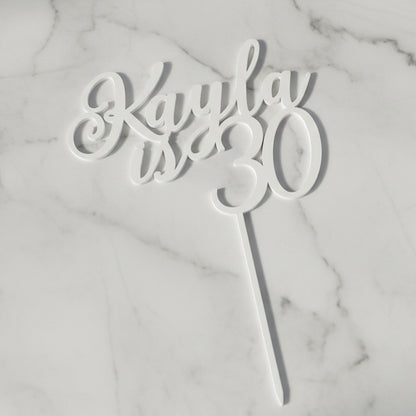 Personalised name and age acrylic cake topper in mirror gold on a birthday cake