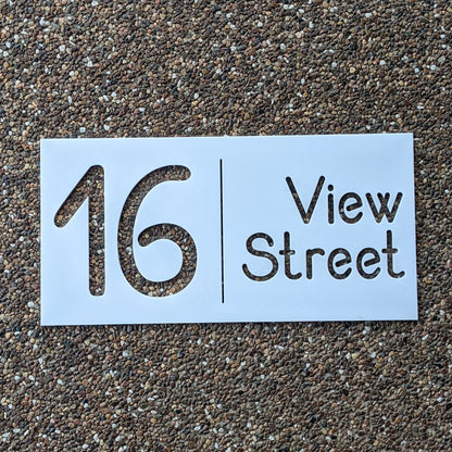Street address sign on a textured surface
