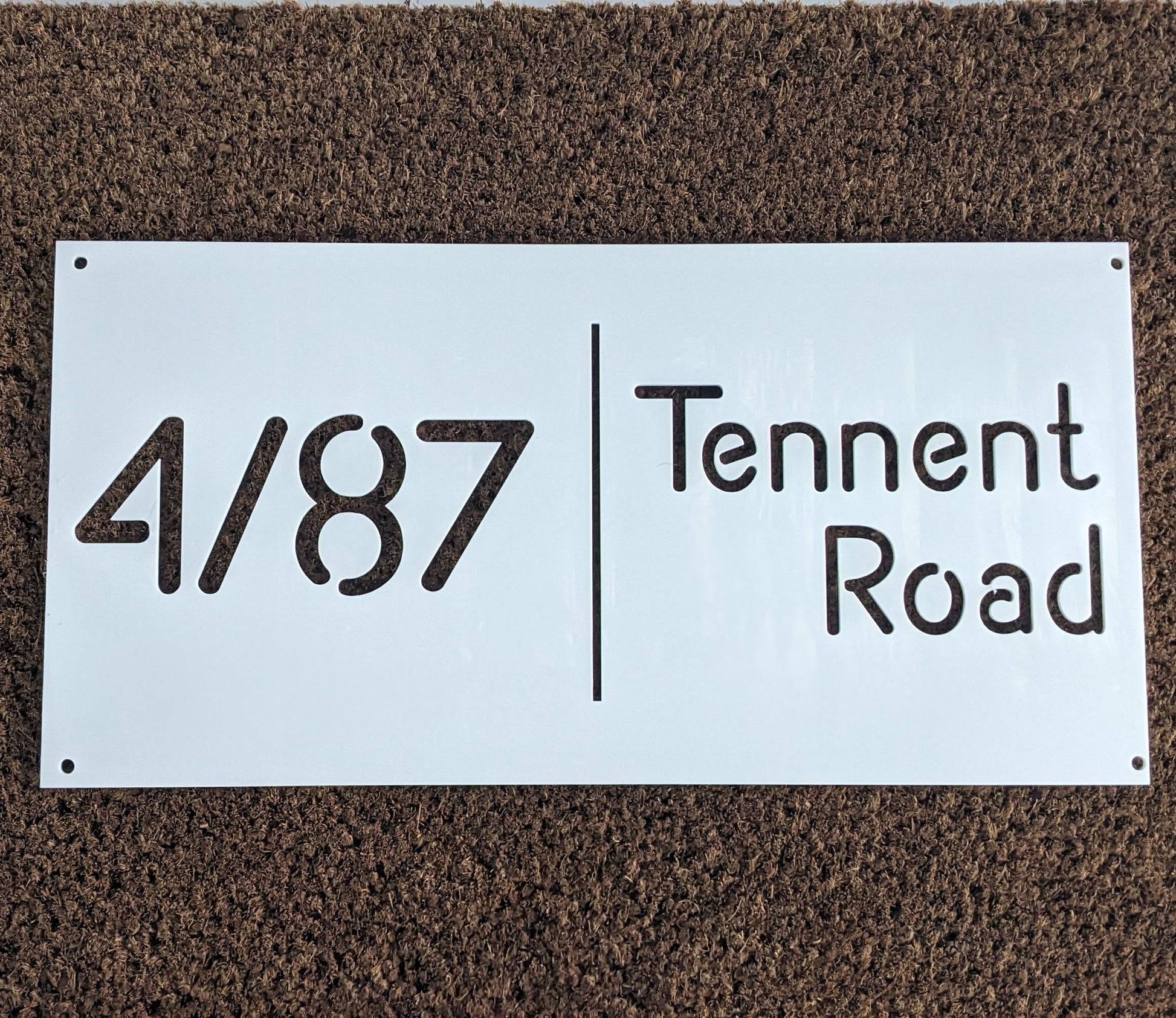 Sign for house with street address on it in white acrylic 